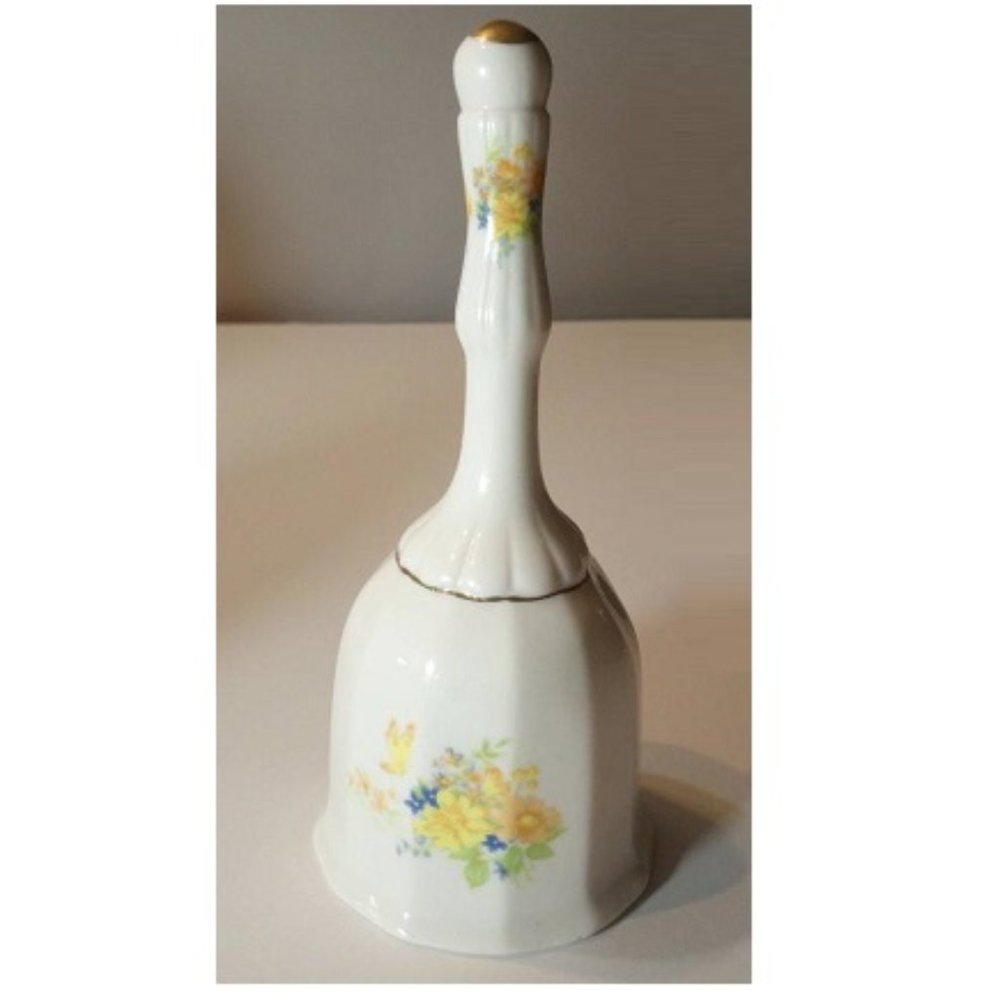 White Porcelain Bell with Yellow Floral Design